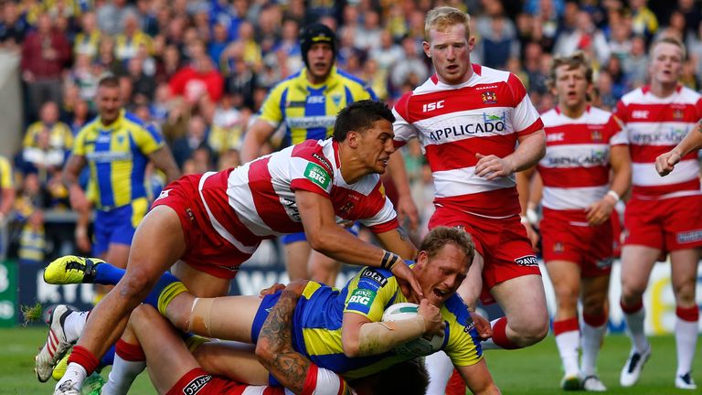Ben Westwood scores a try during the Super League match between Warrington Wolves and Wigan Warriors
