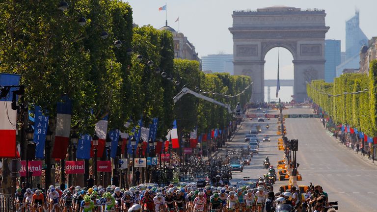 The peloton makes its way down the Champs-Elysees 