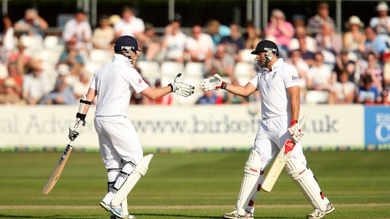 Graeme Swann (L) congratulates Tim Bresnan (R) of England on reaching his half century during the Essex v England match at the County Ground on June 30, 2013 in Chelmsford, England