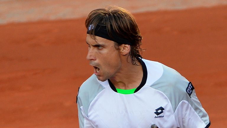 Spain's David Ferrer reacts after a point against France's Jo-Wilfried Tsonga during their French Open semi final
