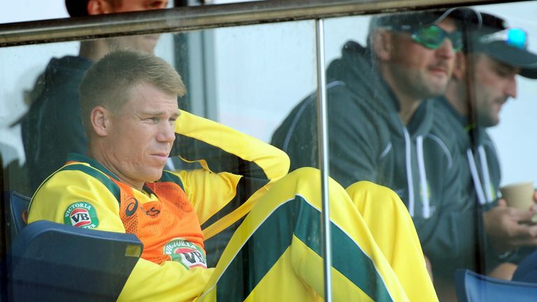 David Warner watches from team dressing room after being dropped for today's game during the ICC Champions Trophy match at Edgbaston, Birmingham.