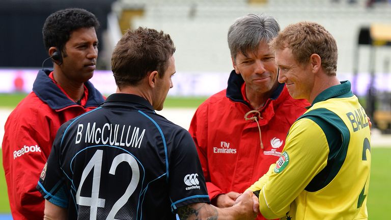New Zealand captain Brendon McCullum and Australian counterpart George Bailey shake hands with the umpires after their ICC Champions Trophy clash is abandoned at Edgbaston due to rain