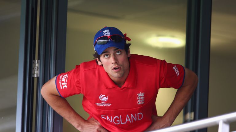 Alastair Cook looks out from the dressing room as rain falls preventing play during the ICC Champions Trophy Final match between England and India at Edgbaston