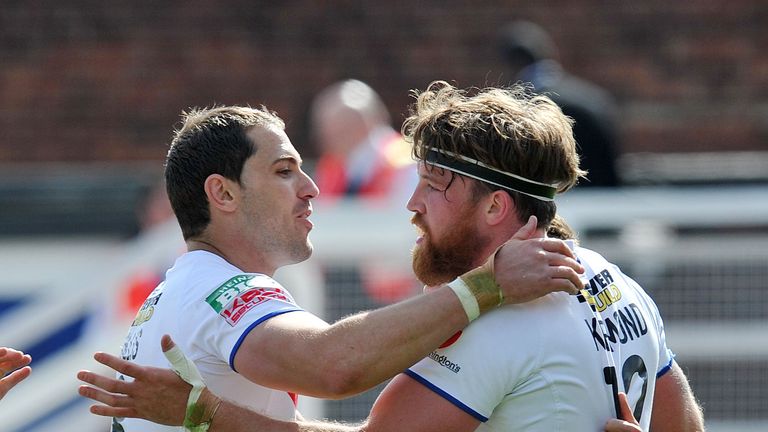Danny Kirmond (right) is congratulated by Dean Collis after scoring a try during the Super League match at The Rapid Solicitors Stadium
