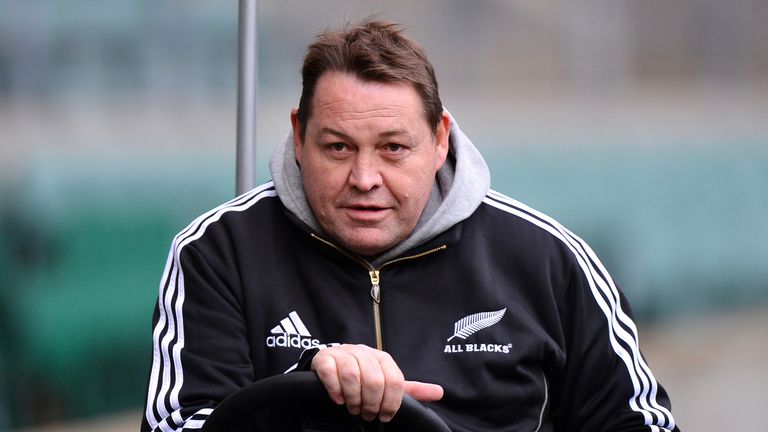 New Zealand head coach Steve Hansen drives a buggy on the pitch during a training session at Twickenham Stadium
