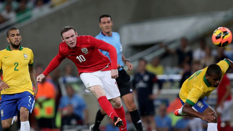 Wayne Rooney of England scores the second goal against Brazil