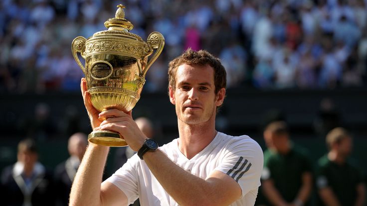 File photo dated 07/07/2013 of Great Britain's Andy Murray celebrates with the trophy after defeating Serbia's Novak Djokovic in the Men's Final.