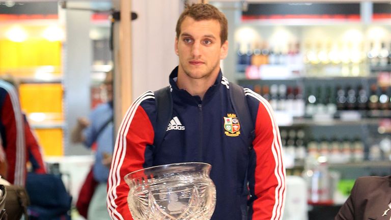 Sam Warburton: Lions captain arrives in Heathrow Airport with the series trophy