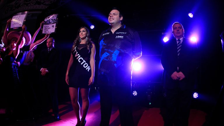 Adrian Lewis enters the Winter Gardens for his World Matchplay darts semi-final.