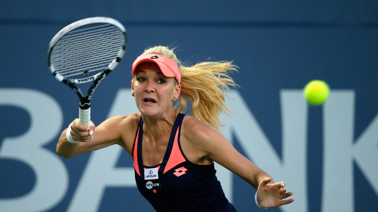Agnieszka Radwanska of Poland returns a shot to Jamie Hampton during their semi-final match at the WTA Bank of the West Classic at Stanford University 
