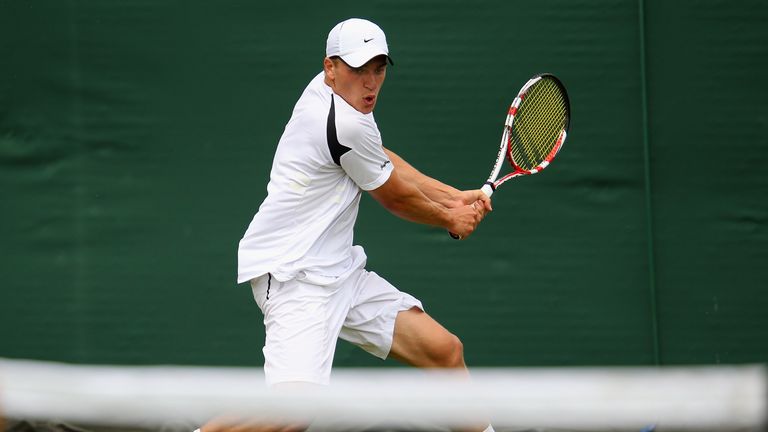 Alexander Ward of Great Britain plays a backhand in his match against Ryan Harrison of USA during day one of the Wimbledon Championships 2011 Qualifying on June 13, 2011 in London, England