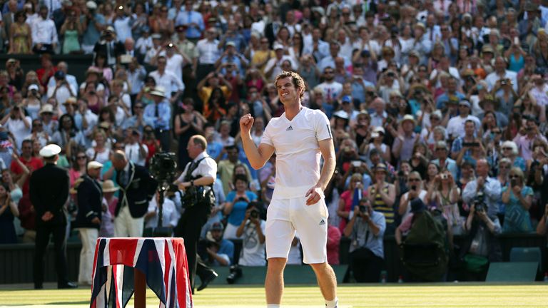 Andy Murray of Great Britain celebrates victory after the Gentlemen's Singles Final match against Novak Djokovic of Serbia on day thirteen of the Wimbledon Lawn Tennis Championships at the All England Lawn Tennis and Croquet Club on July 7, 2013 in London, England