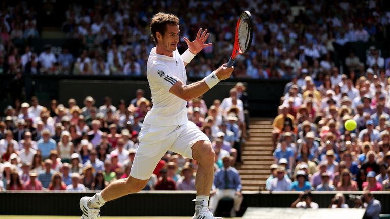 Andy Murray of Great Britain plays a forehand during the Gentlemen's Singles Final match against Novak Djokovic of Serbia on day thirteen of the Wimbledon Lawn Tennis Championships at the All England Lawn Tennis and Croquet Club on July 7, 2013 in London, England