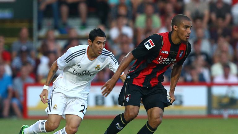 Lewis Grabban of AFC Bournemouth shields the ball from Angel di Maria of Real Madrid during a pre season friendly.