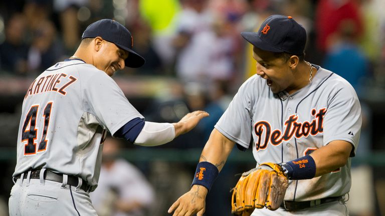 Victor Martinez and Miguel Cabrera of the Detroit Tigers celebrate after defeating the Cleveland Indians in the tenth inning at Progressive Field