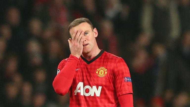 Wayne Rooney of Manchester United looks dejected during the UEFA Champions League Round of 16 Second leg match between Manchester United and Real Madrid at Old Trafford on March 5, 2013.