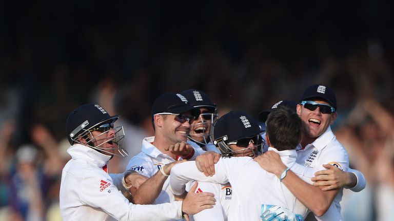 Graeme Swann of England is mobbed by team mates after taking the final Australia wicket in the second Ashes Test