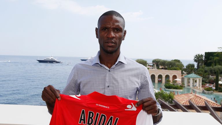French international football defender Eric Abidal poses after a press conference, on July 8, 2013 in Monaco. Abidal has signed a one-year contract with Ligue 1 newcomers, the big-spending principality club said. The 33-year-old, who left Spanish La Liga champions Barcelona at the end of last season following six years in Catalonia, has an option for a second season.