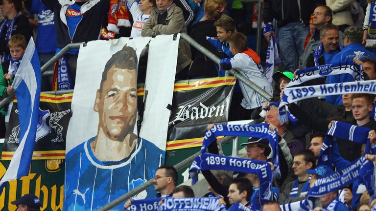 SINSHEIM, GERMANY - OCTOBER 19:  Supporters of Hoffenheim hold up a placard showing badly injured player Boris Vukcevic prior to the Bundesliga match between 1899 Hoffenheim and SpVgg Greuther Fuerth at Rhein-Neckar-Arena on October 19, 2012 in Sinsheim, Germany.  (Photo by Alex Grimm/Bongarts/Getty Images)