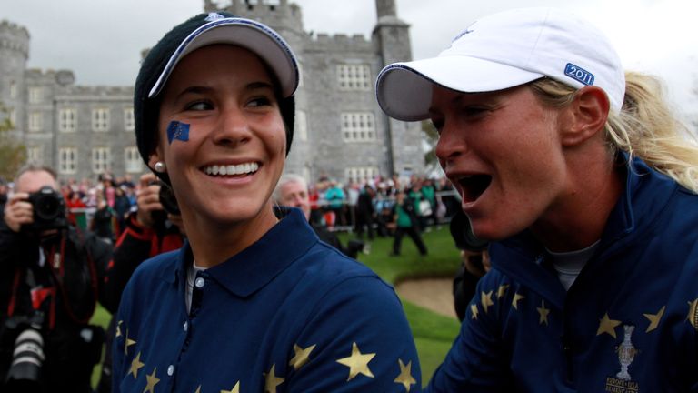 Azahara Munoz and Suzann Pettersen celebrate their team's dramatic 15-13 victory