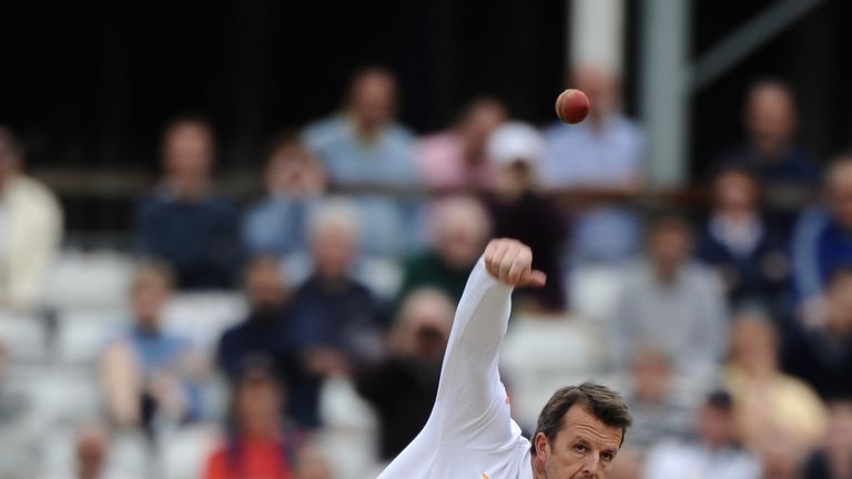 Graeme Swann of England bowling during the LV= Challenge match against Essex