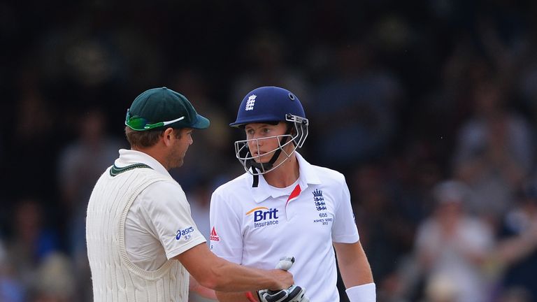  Joe Root of England is congratulated by Ryan Harris of Australia during day three of the second Ashes Test