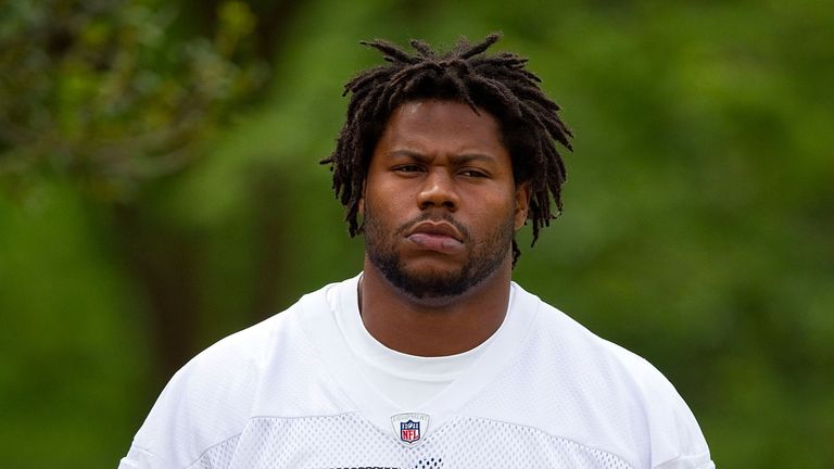 Landon Cohen makes his way to practice at Carolina Panthers Rookie Camp on May 12, 2012 in Charlotte, North Carolina
