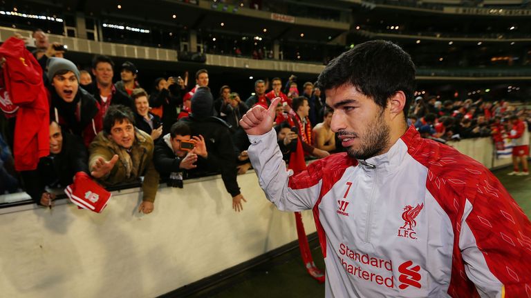 Luis Suarez of Liverpool getsures to the fans after the match between the Melbourne Victory and Liverpool at Melbourne Cricket Ground on July 24, 2013