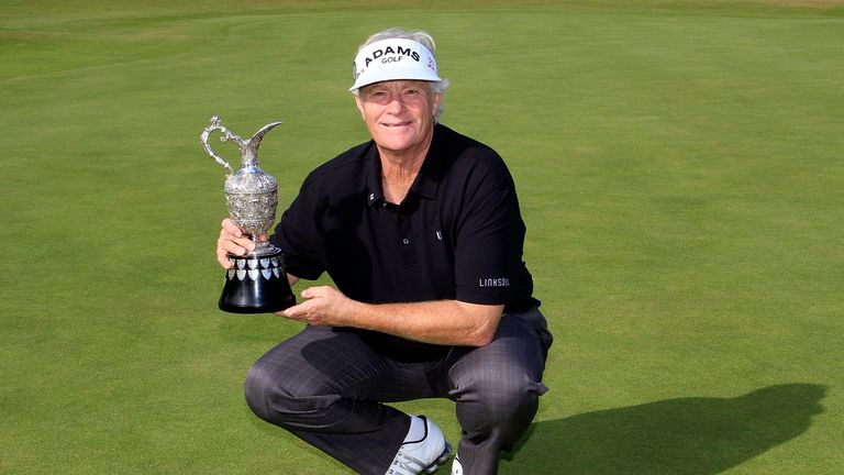 Mark Wiebe of the United States poses with the trophy after winning the play-off against Bernhard Langer of Germany after the final round of The Senior Open Championship played at Royal Birkdale Golf Club on July 29, 2013 in Southport, United Kingdom