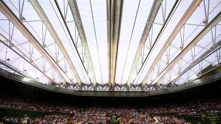 LONDON, ENGLAND - JUNE 28: A general view of centre court with the roof closed during the Gentlemen's Singles third round match between Andy Murray of Great Britain and Tommy Robredo of Spain on day five of the Wimbledon Lawn Tennis Championships at the All England Lawn Tennis and Croquet Club on June 28, 2013 in London, England.  (Photo by Julian Finney/Getty Images)