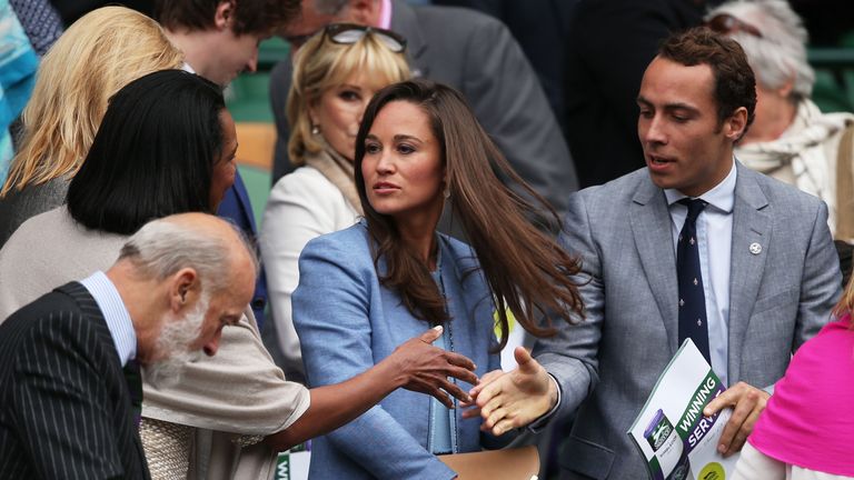 LONDON, ENGLAND - JUNE 24:  James Middleton shakes hands with Condoleezza Rice next to Pippa Middleton during the Gentlemen's Singles first round match between Andy Murray of Great Britain and Benjamin Becker of Germany on day one of the Wimbledon Lawn Tennis Championships at the All England Lawn Tennis and Croquet Club on June 24, 2013 in London, England.  (Photo by Clive Brunskill/Getty Images)