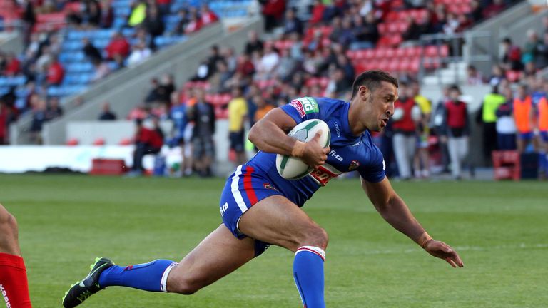 Wakefield Wildcats' Paul Sykes scores a try during the Super League match at Salford City Stadium, Eccles.