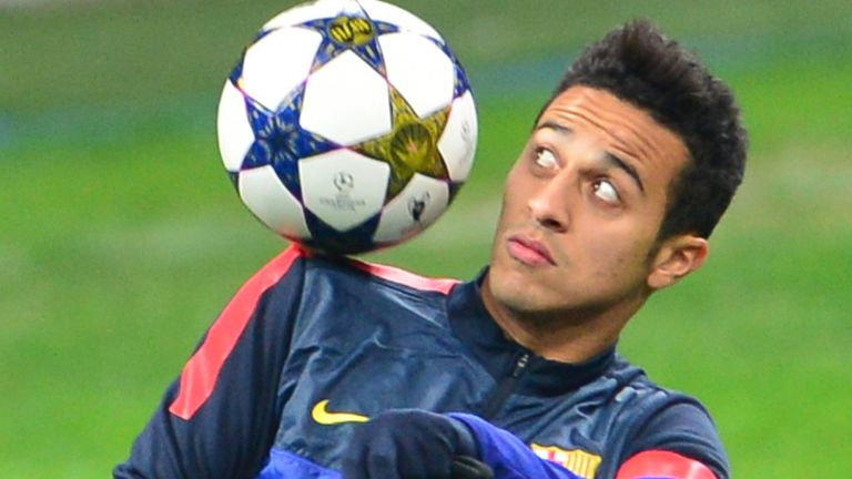 Barcelona's midfielder Thiago Alcantara controls a ball during a training session on the eve of an UEFA Champions League football match against AC Milan on February 19, 2013 at San Siro Stadium in Milan.  AFP PHOTO / GIUSEPPE CACACE        (Photo credit should read GIUSEPPE CACACE/AFP/Getty Images)