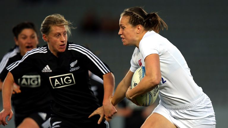 AUCKLAND, NEW ZEALAND - JULY 13: Emily Scarratt of England runs the ball during game one of the women's rugby series between New Zealand and England at Eden Park on July 13, 2013 in Auckland, New Zealand.  (Photo by Phil Walter/Getty Images)