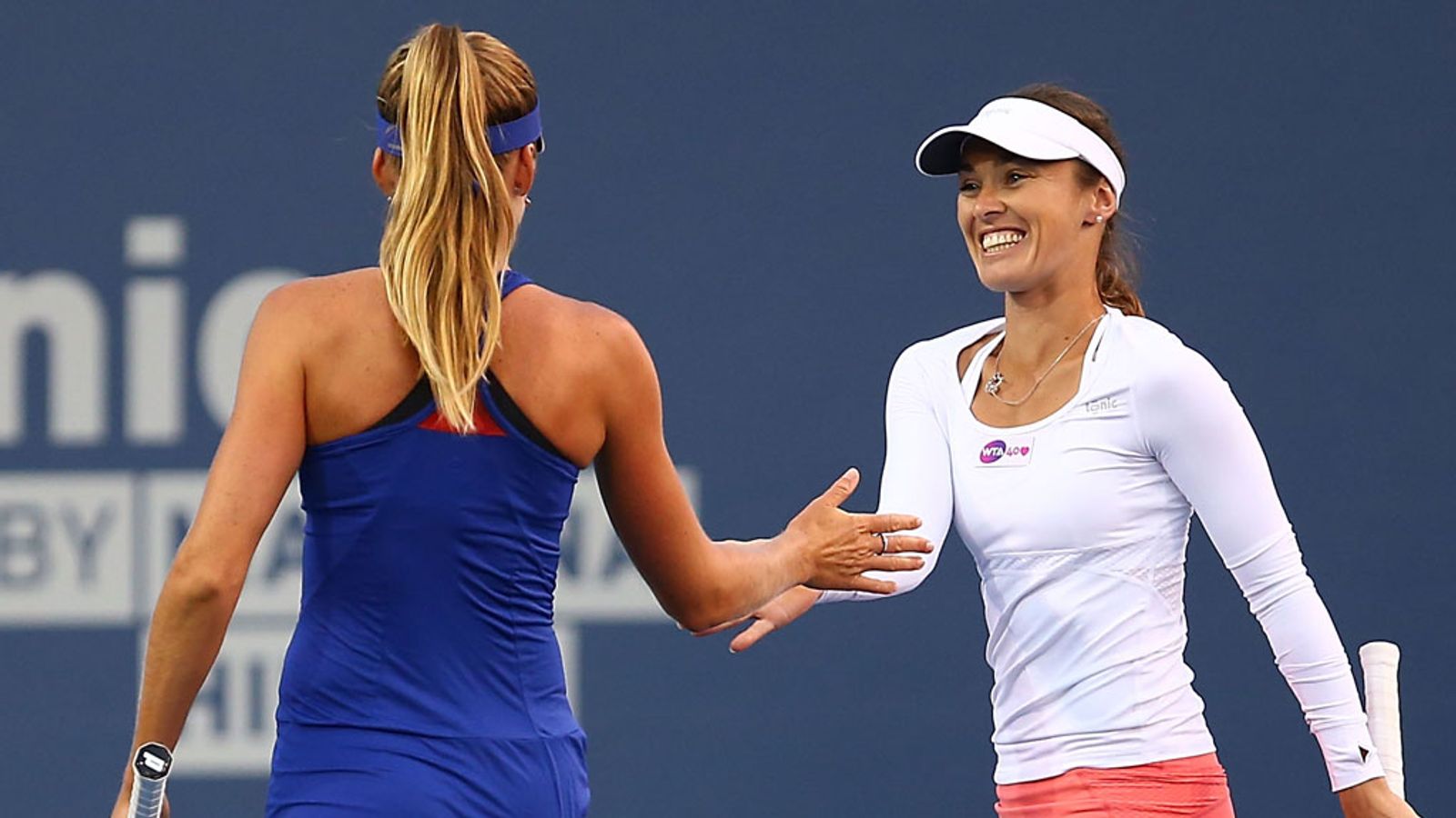 Martina Hingis wins on doubles return but confirms no plan for singles