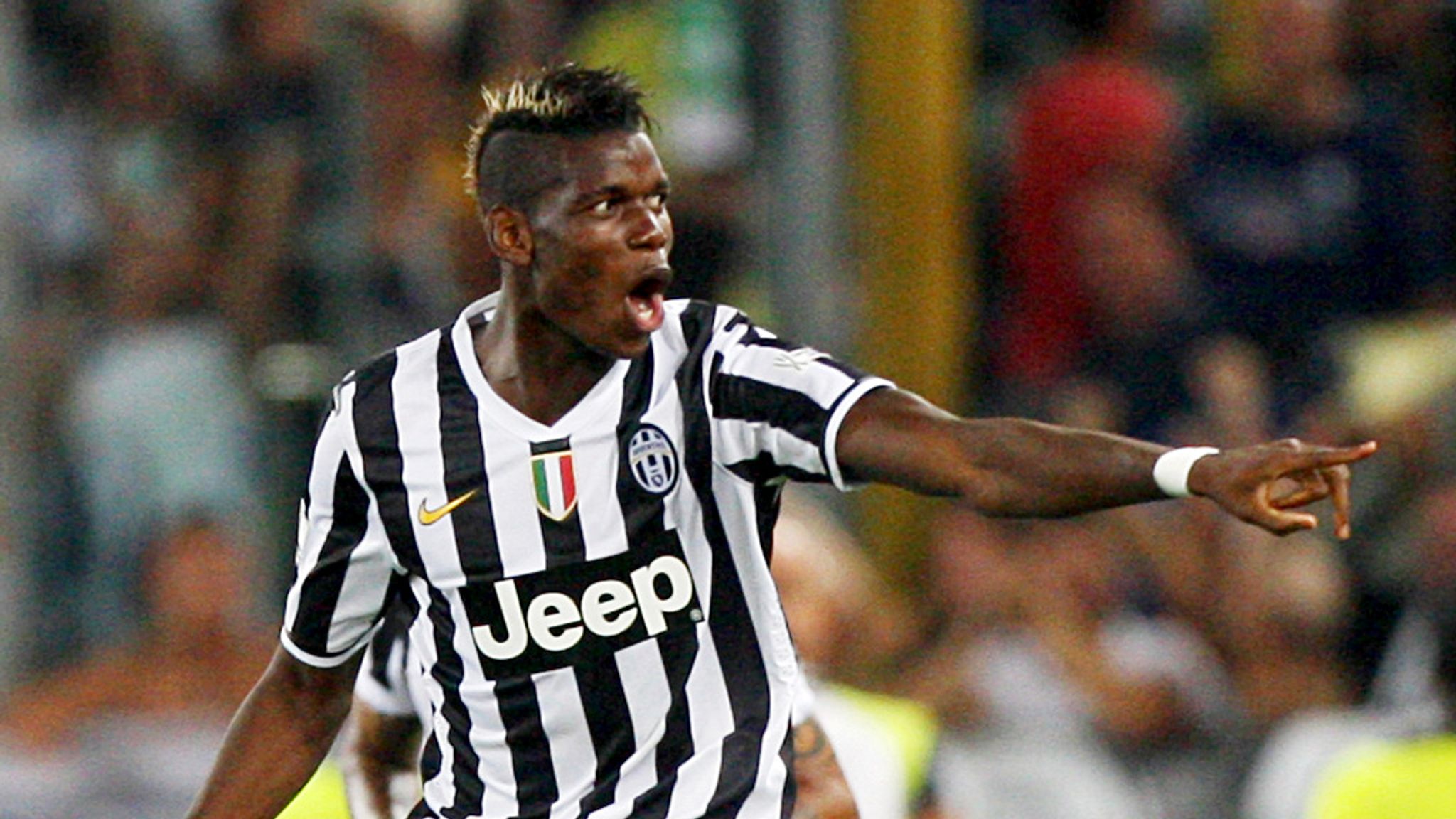 Juventus midfielder Paul Pogba happy where he is following reports of a ...