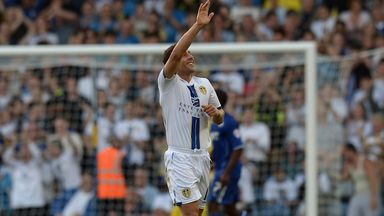 Image of Michael Brown: Waves goodbye to Leeds
