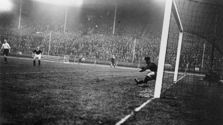 Goalkeeper Ted Hufton is beaten by a shot from Alan Jackson during Scotland's 5-1 win over England