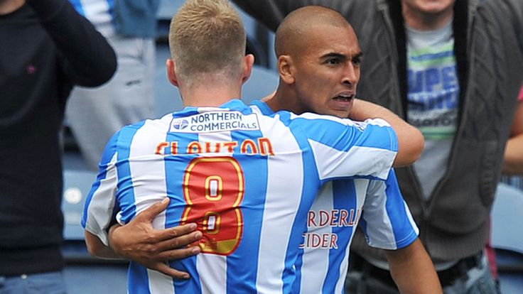 Huddersfield Towns James Vaughan is congratulated on scoring his team's first goal during the Sky Bet Championship match at the John Smith's Stadium, Huddersfield.