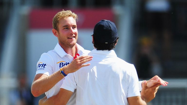 Broad celebrating his 200th Test wicket with England captain Alastair Cook