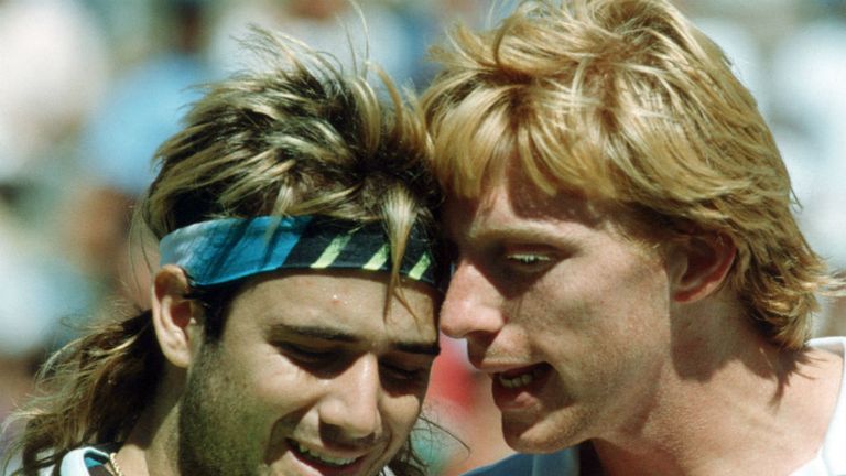 Agassi of the USA and Boris Becker of Germany talk after a match at the US Open in Flushing Meadows on August 25, 1990 in New York