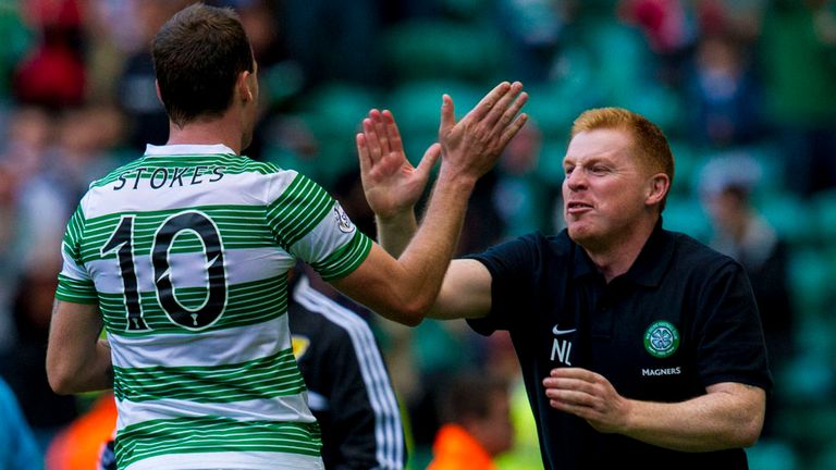 Celtic striker Anthony Stokes is congratulated by manager Neil Lennon after scoring his second goal