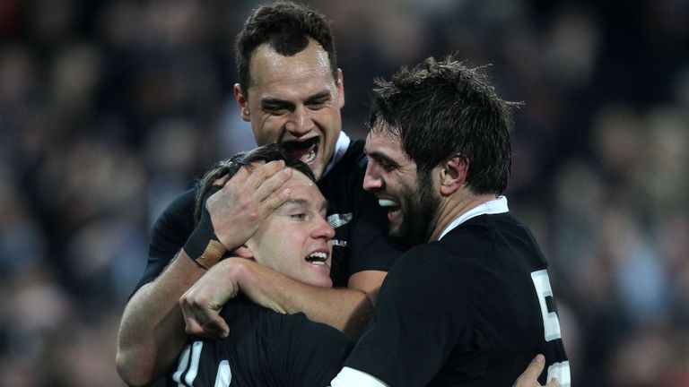 Israel Dagg C, Sam Whitelock R and Ben Smith of New Zealand celebrate his try in the match between New Zealand and Australia