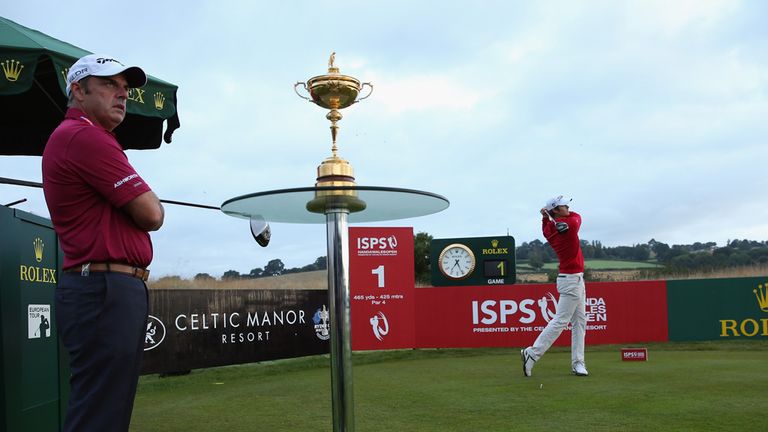 Espen Kofstad tees off with Paul McGinley watching