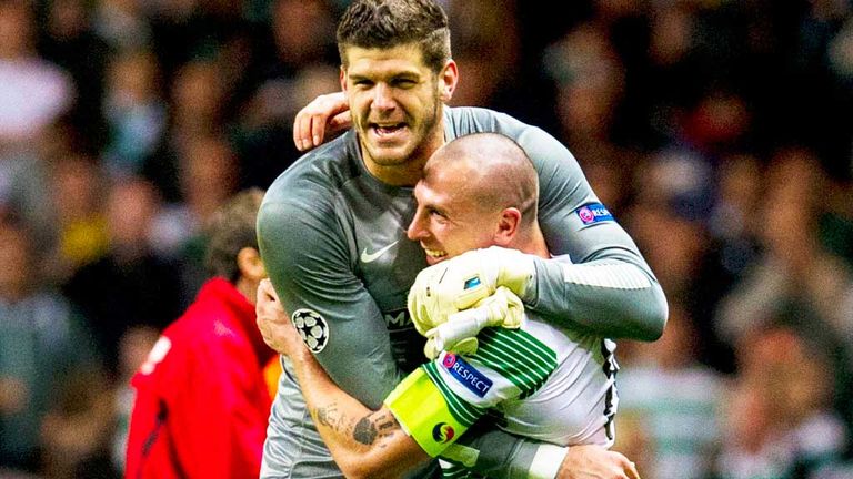Fraser Forster: Celtic goalkeeper celebrates with captain Scott Brown