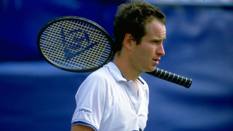 McEnroe of the USA prepares to serve during the US Open at Flushing Meadow in New York