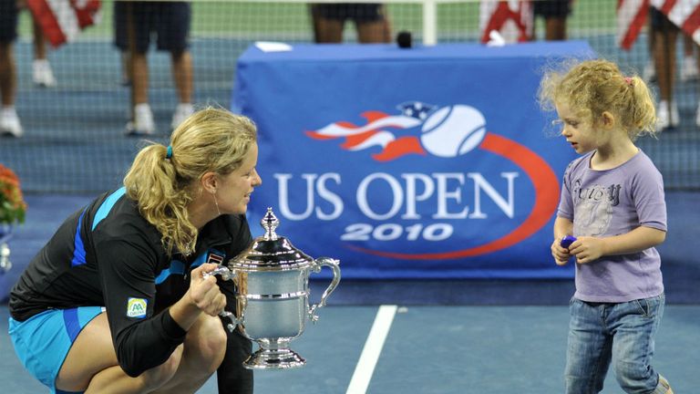 Clijsters of Belgium with daughter Jada celebrates her win over Vera Zvonareva at the US Open 2010 
