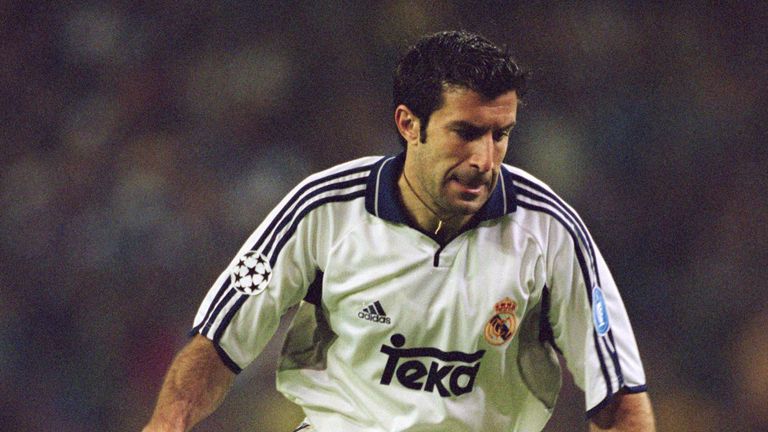 stupid-skunk802: luis figo wearing half real madrid and half barcelona  jersey taking action with fullbody view