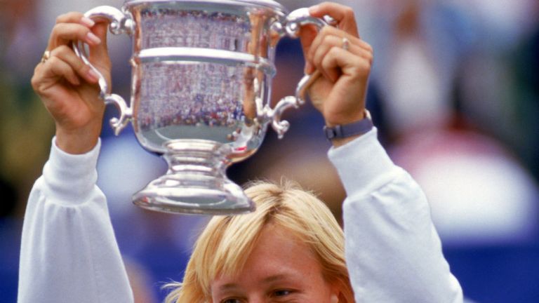 Navratilova hoists her trophy as she celebrates winning the Womens US Open title in 1986 at Flushing Meadows 