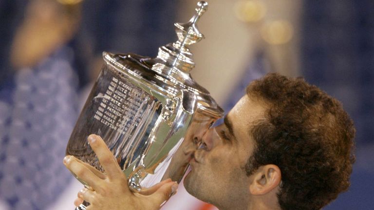 Sampras celebrates his win over Andre Agassi in the final of the US Open 2002
